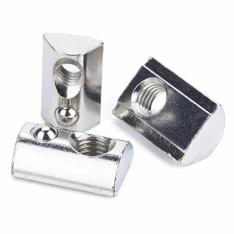 Dead Solid M6 Spring T Nuts Designed For 4040 Aluminum Extrusion Profiles in smooth nickel finish, showcasing three toggle fasteners.