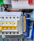10 Pack Brass Terminal Bus Bar With Eight Position Screw Terminals installed in electrical panel, blue finish