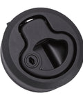 Front view of round black flush-mount boat hatch latch with pull lock and keyhole