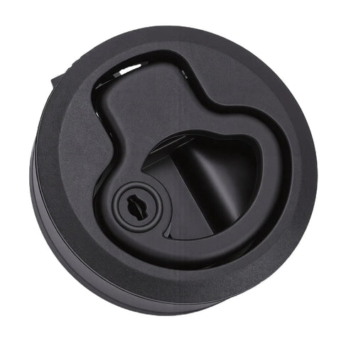 Front view of round black flush-mount boat hatch latch with pull lock and keyhole
