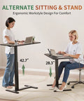 Two women using the Mobile Standing Desk With Wheels Height Adjustable Pneumatic Laptop Desk Overbed Table, 28.3" to 42.7" height
