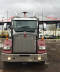 Heavy Duty 10 Foot Red Round Sling for Lifting, Towing and Recovery used on truck with trailer in lot