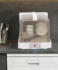 Slick Portable Countertop Dishwasher With Massive 8 Liter Tank And Three Wash Settings Featuring Full 360 Spin Sprayers for easy cleanup on kitchen counter.