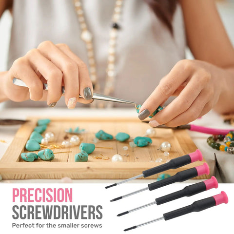 11 Piece Pink Womens Compact Crafts And Home DIY Tool Kit Set With Pliers Cutters And Precision Screwdrivers For Ladies Ideal For Quick Home Repairs And Craft Projects, focus on precision screwdrivers next to hands using a tool on gemstones.