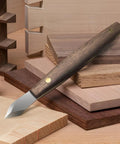 Badass Woodworking Marking Knife Built Tough With A Razor Sharp Double Bevel Blade And Slick Leather Sheath on wood pieces.