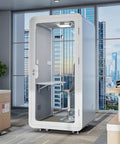 Portable One To Two Person Soundproof Office Pod With Thick Acoustic Panels and Whisper Quiet Ventilation in modern office setting.