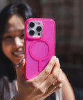 Milan Snap Case For IPhone 16 Pro Max Pink Glitter MagSafe Compatible Case held up outdoors showing sleek design