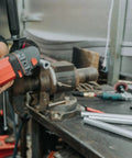Top Shelf 3/4 Inch Outside Diameter 5/16 Inch Inner Bore 8 Inch Long Mild Steel Seamless Tubes 10 Pack during cutting process with angle grinder.