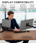 Man using adjustable laptop desk mount arm for 17 inch laptops and 32 inch monitors, holds up to 22 lbs, dual mounting, black