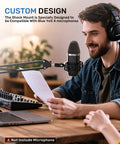 Man using Shock Mount For Yeti X Microphone With 2026 Anti Vibration Suspension Clip on desk setup