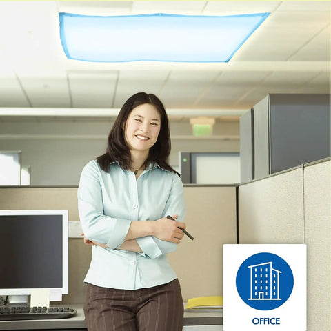Woman in office with Tranquil Blue Fluorescent Light Covers 4 Pack For Classroom Office And Home, calm ambiance overhead.