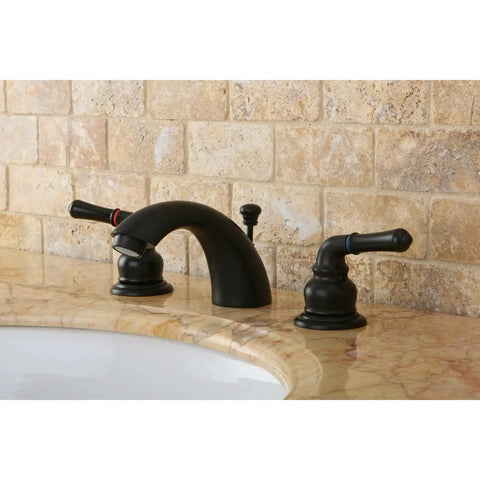 Magellan Mini Widespread Bathroom Faucet With Pop Up Drain Solid Brass Construction Deck Mount on marble sink