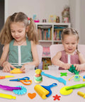 Front view: 28-piece dough and clay tools kit for kids with colorful animal cutters, rollers, and safety scissors.