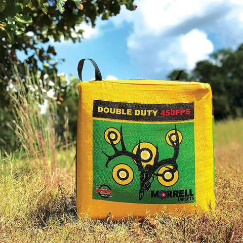 Beast Mode Archery Target Bag For 450 FPS Practice Cube Field Point Target with bullseyes on display in grassy outdoor setting.