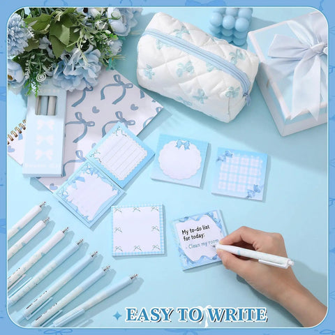Hand writing on sticky note with Blue Bow Stationery Set For School And Office Dope A5 Notebook 12 Smooth Gel Pens 6 Sticky Notes Pencil Pouch