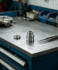 Tall Truck Lift Extension Adapter with 1.38 inch lift heightening leg and 1.54 inch hole jack riser on workbench