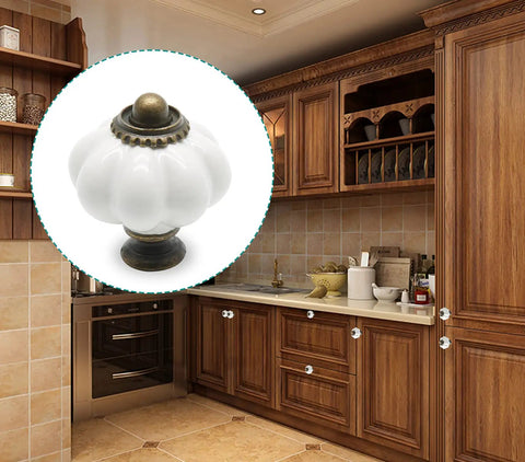 Top Shelf Vintage White Ceramic Pumpkin Cabinet Knobs, 1.3-inch, styled on kitchen cabinetry, perfect for quick upgrades.