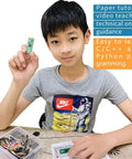 Boy holding Raspberry Pi Pico Starter Kit With Breadboard I2C 1602 LCD Display Module And 9g Micro Servo for hands-on projects.