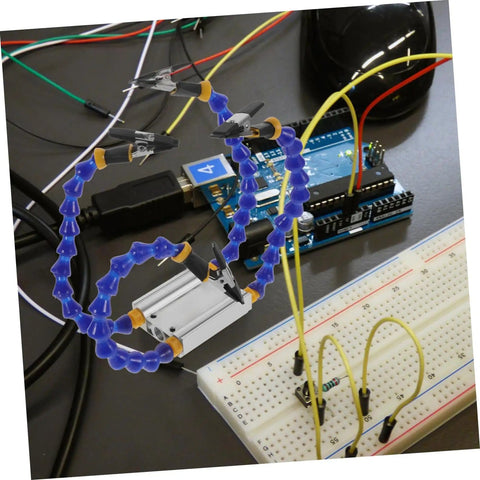 Heavy-Duty Soldering Helping Hand Tool With Flexible Arms And Welding Station Holder for precision PCB repair and DIY electronics.