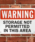 Heavy Duty Warning Sign For No Storage Zones Built Tough As Nails With Smooth Rounded Edges For Safe Handling Made From Durable Recyclable Plastic That Handles Indoor Warehouse Jobs And Outdoor Weather Like A Pro Delivering Clear Safety Alerts Daily on a brick wall.