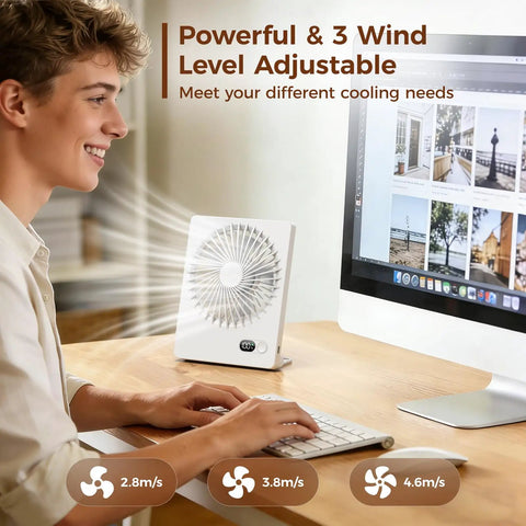 Person using Tiny But Mighty Portable Desk Fan Battery Operated and Rechargeable, Ultra Quiet 180 Degree Tilt Folding Personal Fan With 3 Speed Settings