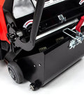 Close-up of Top Shelf Electric Floor Sweeper Workhorse's three brush setup with a black and red design.