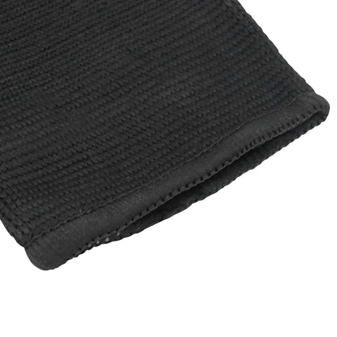 Close-up of the knit material of a black Youth Ankle Compression Sleeve For Active Kids Knit Ankle Brace For Sprains Tendonitis And Arthritis.