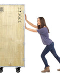 Woman pushing a large wooden crate on Four Inch Heavy Duty Swivel Plate Caster Wheels With Brake And 360 Degree Dual Locking