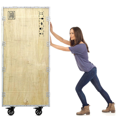 Woman pushing a large wooden crate on Four Inch Heavy Duty Swivel Plate Caster Wheels With Brake And 360 Degree Dual Locking