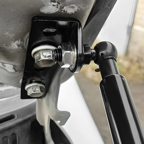 Four Pack 10mm Ball Stud Mounts For Gas Struts With Hardware Nuts 5 16 18 Thread 9 16 Inch Long Shank Carbon Steel Ball End Gas Spring Strut Studs For Hood Lift Support Black installed on hood bracket