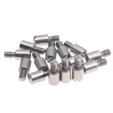 Fifteen Piece Nickel Brass Location Fix Pin Screws Lock Tight On Camera Quick Release Cheese Plates And Top Handles For A Clutch Shooting Rig Setup No Sweat, silver nickel brass screws laid out.