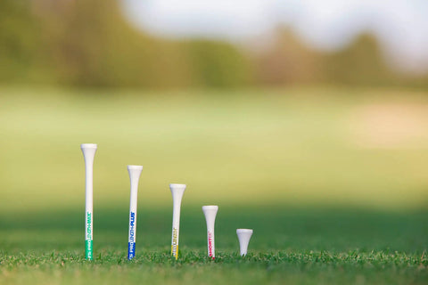 PTS Wood Golf Tees 135 Count Three And A Quarter Inch Long For Drivers And Woods Durable Natural Hardwood Tees on grass