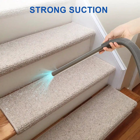 Using Dyson Dryer Vent Cleaner Kit With Lint Brush And Extension Hose For Deep Cleaning Of Dryer Vents And Lint Traps on carpeted stairs.