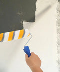 No Sweat Chemical Fiber Paint Roller For Smooth Ceiling Jobs And Easy Interior Decorating With Pro Level Lines And Zero Fuss Application For Quick Diy Makeovers And Touch Ups, painting a wall with gray paint.