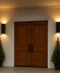 Up And Down Outdoor Wall Light With Dusk To Dawn Sensor Pack Of 2 Matte Black Exterior Sconces illuminating front porch