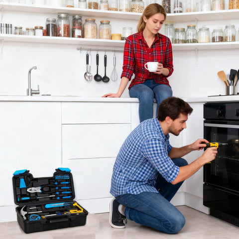 Person using tool from Grab And Go 39 Piece Basic Home Tool Set For DIYers with Quick Fixes in kitchen, toolbox visible on floor