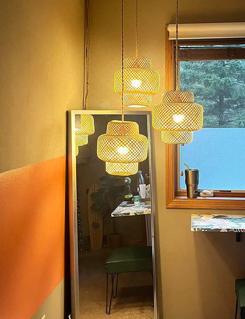 Dope Boho Plug In Pendant Light With Macrame Shade Two Pack Hanging Lights in bedroom reflects in a mirror.