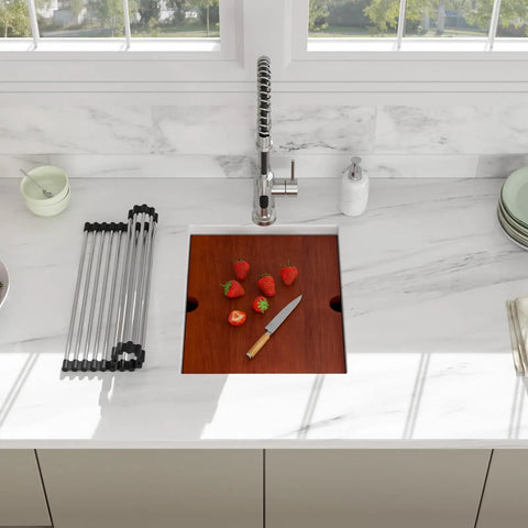 Top view of Undermount 14 Inch Stainless Steel Bar Sink With Deep 10 Inch Bowl 16 Gauge T304 Workstation Kitchen Sink For Outdoor RV Camper Under Counter Single Bowl Heavy Duty Rust Resistant Easy To Clean with wooden cutting board placed over it and strawberries.