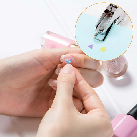 Three Piece Hole Punch Set With Round Heart And Star Shapes used on paper for DIY scrapbooking, handheld with soft grip for crafts.