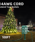 Outdoor Waterproof Power Strip With 100 Ft Heavy Duty Extension Cord 6 Grounded Outlets For Garden And Yard Decor 15A At 1875W ETL Listed near decorated tree at night.