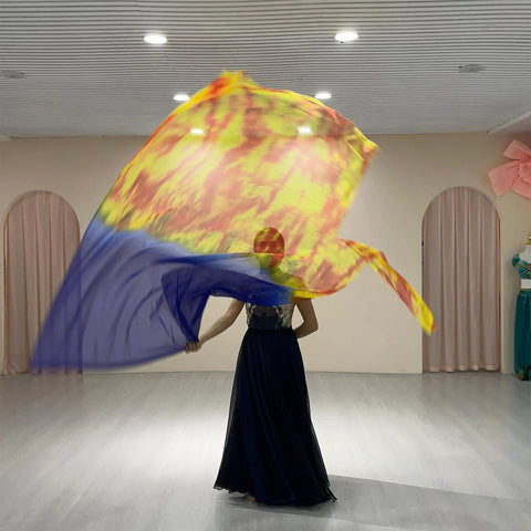 Worship flags for dance with soft chiffon fabric in vibrant colors held by a dancer, showcasing fluid movement and elegance.