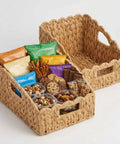 Set Of 2 Scalloped Wicker Storage Baskets With Handles For Food Organization, filled with snacks and treats, size 7.5 x 8.5 x 10 inches