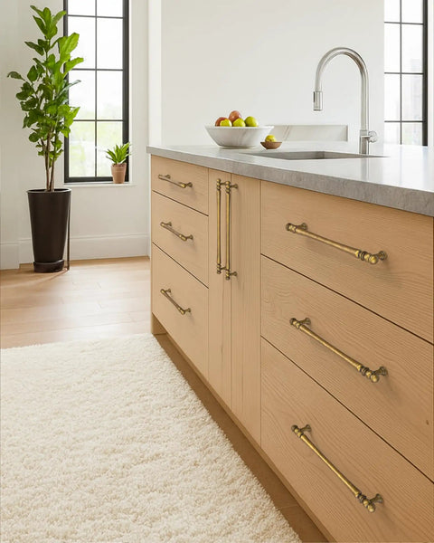 Modern kitchen with 10 Pack 3 Inch Antique Brass Cabinet Pulls, Vintage Zinc Alloy Handles on light wood drawers, aged brass hardware