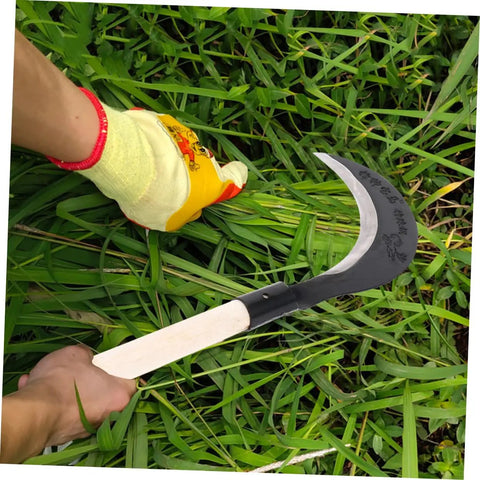 Person using Manganese Steel Hand Scythe For Weeding And Cultivation With Comfortable Grip One Handed Garden Tool For Efficient Weeding