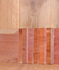 Snag These Ridiculously Smooth Three Quarter By Five By Twenty Four Inch Aromatic Cedar Hardwood Planks arranged side by side.
