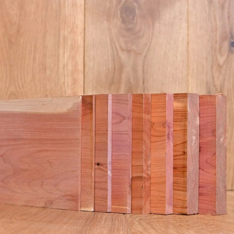 Snag These Ridiculously Smooth Three Quarter By Five By Twenty Four Inch Aromatic Cedar Hardwood Planks arranged side by side.