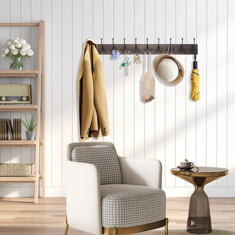Rustic 34 Inch Wall Mounted Coat Rack With Ten Decorative Hooks Heavy Duty Pine Wood Rail For Entryway Or Living Room Holds Up To 15 Lbs Per Hook Old Wood Color Farmhouse Style shown installed on white wall with various items hanging