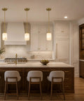 Karjearl Alabaster Pendant Lights Kitchen Island, Modern Gold Hanging Light in bright kitchen over wooden island.