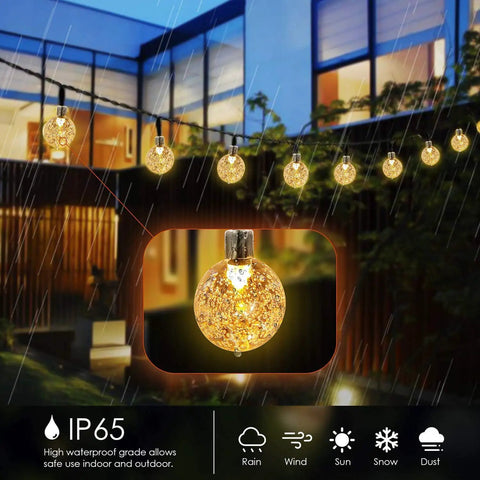 Battery Operated Globe Fairy Lights 16 Feet Waterproof With Timer And 8 Modes 30 LEDs illuminating a rainy outdoor patio