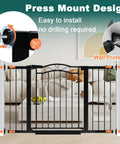 Ultra Wide Baby Gate With Door, Fits 65.4 To 68.1 Inches, 30 Inch Tall, Pressure Mounted No Drill, Indoor Tension Metal Safety Gate, black, in a modern living room setup, showing close-up on the pressure mount design and wall protector.